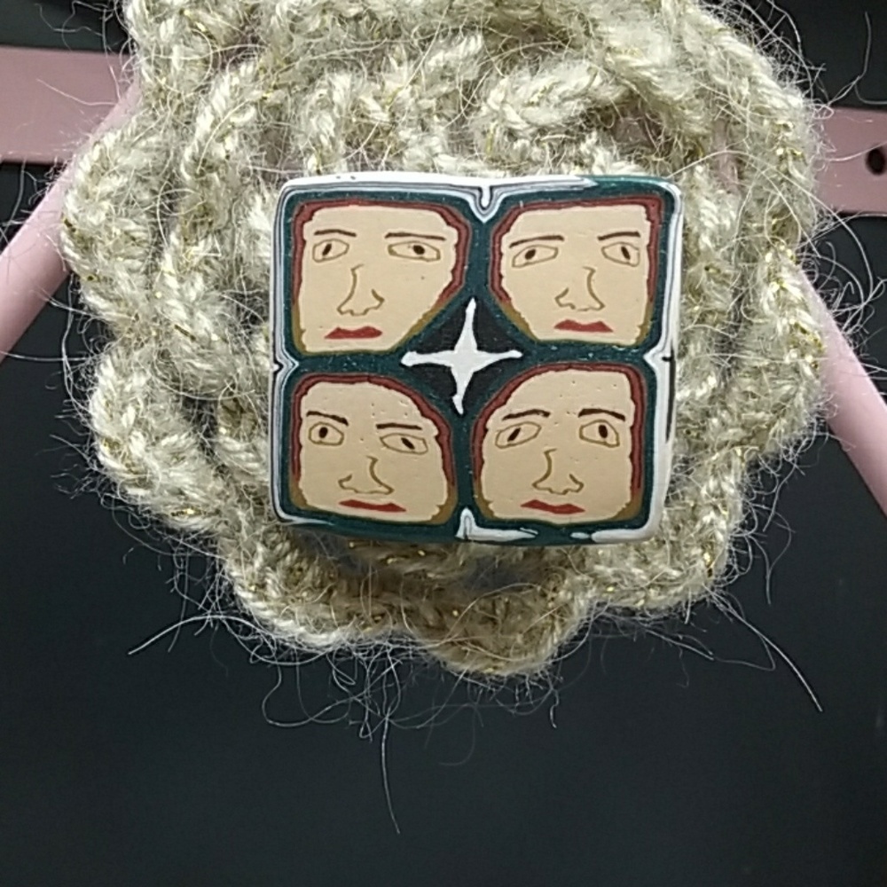 Brooch.